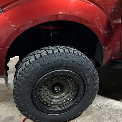 18 inch Black Rhino Barracade in OD Green w/ Black Rock Guard on a 2015 Nissan Frontier