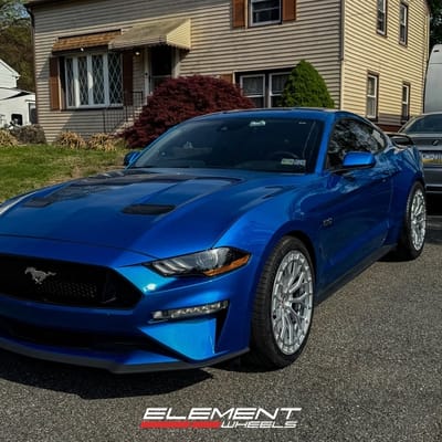 Staggered 20 inch Ferrada FR12 in Machine Silver on a 2021 Ford Mustang