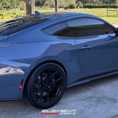 Staggered 20 inch Variant Nysa in Gloss Black on a 2024 Ford Mustang GT