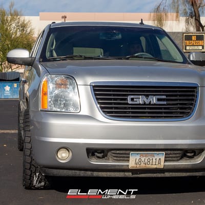 20 inch American Racing AR893 Mainline Gloss Black Machined on a 2013 GMC Yukon 4WD