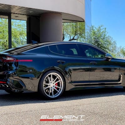 Staggered 20 Inch Rohana RFX2 in Brushed Titanium on a 2018 Kia Stinger GT