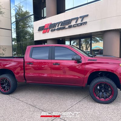 22 inch Fuel Off-Road Catalyst Matte Black w/ Candy Red Lip on a 2024 Chevrolet Silverado 1500 Trail Boss