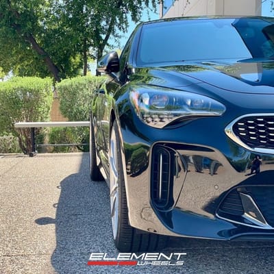 Staggered 20 Inch Rohana RFX2 in Brushed Titanium on a 2018 Kia Stinger GT