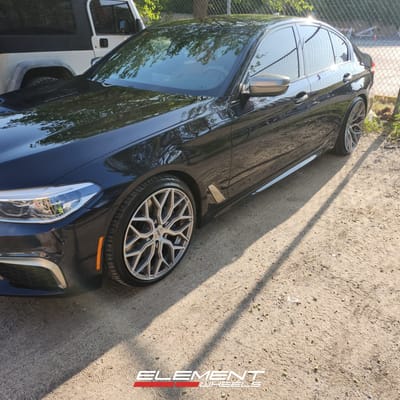 Staggered 20 inch Niche Mazzanti Anthracite Brushed Tint M265 on a 2018 BMW M550i XDrive