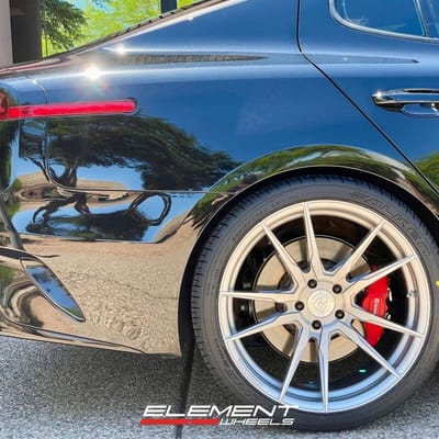 Staggered 20 Inch Rohana RFX2 in Brushed Titanium on a 2018 Kia Stinger GT