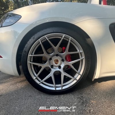 Staggered 20 inch HRE FF01 in Liquid Silver on a 2019 Porsche Boxster 718
