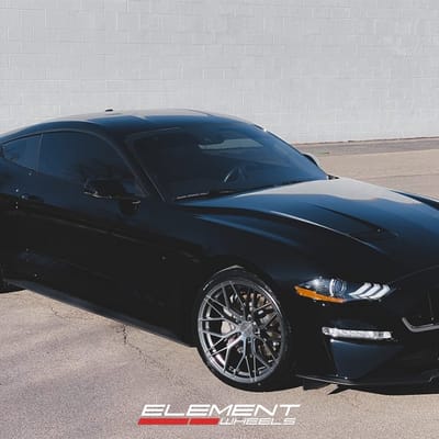 Staggered 20 Inch Avant Garde M520r in Dark Graphite Metallic on a 2017 Ford Mustang GT