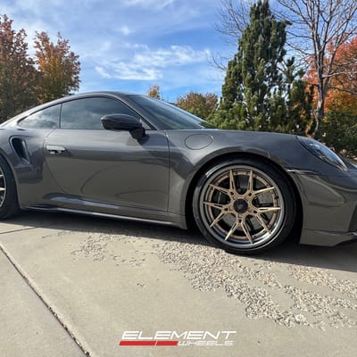Staggered 20/21 inch Variant Nysa 2P in Satin Bronze w/ Gloss Gunmetal Lip on a 2022 Porsche 992 911 Turbo S