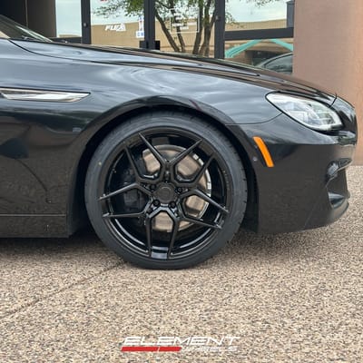 20 inch Staggered Rohana RFX11 in Gloss Black on a 2017 BMW 6 Series