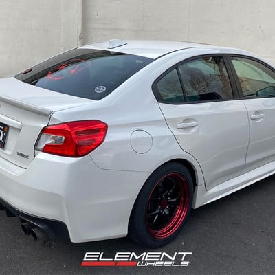 17 inch F1R F105 Gloss Black w/ Red Lip on a 2015 Subaru WRX