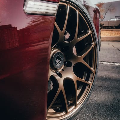 Staggered 19 Inch Ruger Mesh Matte Triple Bronze (Custom) on a 2007 Porsche 911 Carrera 997 Base Narrowbody