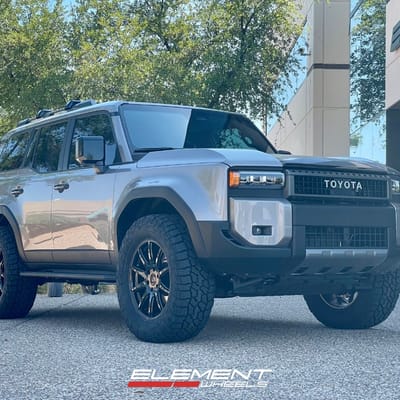 20 inch Raceline 159B Spike in Gloss Black on a 2024 Toyota Land Cruiser w/ Lift