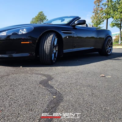 Staggered 20 inch Ace Alloy AFF02 in Black Chrome on a 2005 Aston Martin DB9