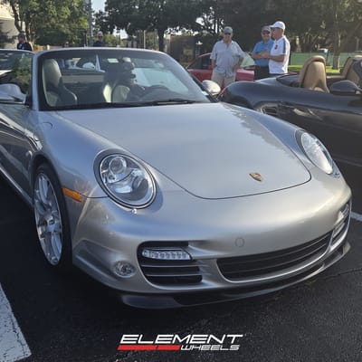 Staggered 19 inch Ruger Mesh in Liquid Silver on a 2010 Porsche 911 Carrera 997 Turbo