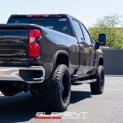 22 inch Moto Metal MO970 Gloss Black Milled Lip on a 2020 Chevrolet Silverado LTZ 3500