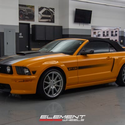 Staggered 20 Inch F1R F101 in Machine Silver on a 2007 Ford Mustang GT