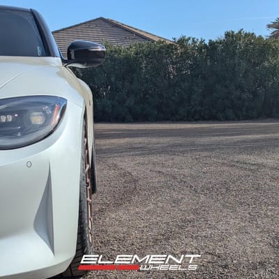19 inch Staggered Variant Aure in Gloss Bronze on a 2024 Nissan Z