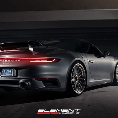 21/22 Double Staggered Variant NTZ-3P Brushed Titanium w/ Polished Lip on a 2024 911 Porsche Turbo S w/ Carbon Ceramic Brakes (Centerlock)