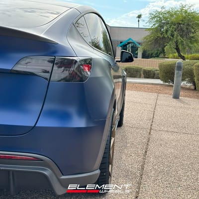 Staggered 22 inch Blaque Diamond BD-F25 Matte Bronze on a 2022 Tesla Model Y (Performance AWD)