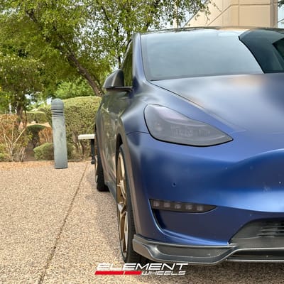 Staggered 22 inch Blaque Diamond BD-F25 Matte Bronze on a 2022 Tesla Model Y (Performance AWD)