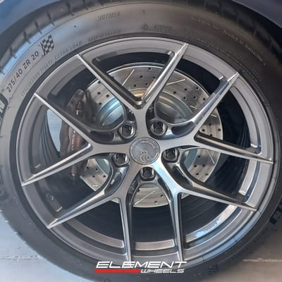 Staggered 20 inch Avant Garde M580R in Dark Graphite Metallic on a 2011 Chevrolet Camaro SS