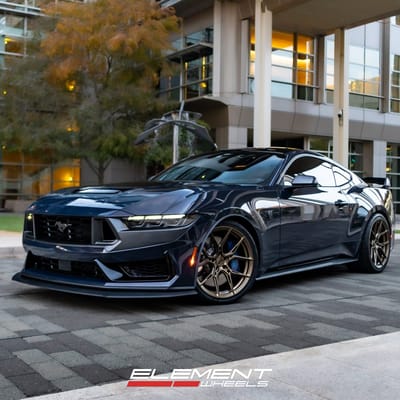 Staggered 20 inch Variant Nysa in Gloss Bronze on a 2024 Ford Mustang Dark Horse