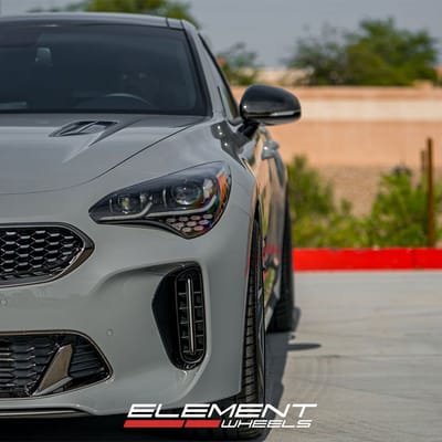 19 inch Variant Xenon Satin Gunmetal w/Red Cap on 2019 Kia Stinger