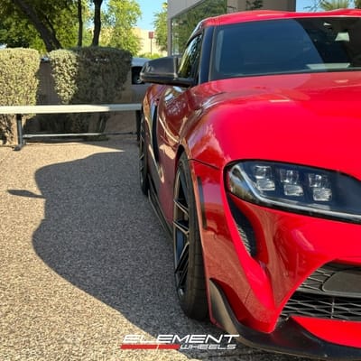 19 inch Staggered Variant Helium Gloss Black on a 2022 Toyota Supra