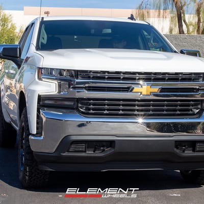 18 inch Moto Metal MO993 Gloss Black Milled on a 2021 Chevrolet Silverado 1500