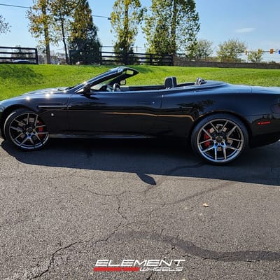 Staggered 20 inch Ace Alloy AFF02 in Black Chrome on a 2005 Aston Martin DB9