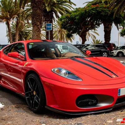Staggered 20 Inch Variant Krypton in Gloss Piano Black on a 2006 Ferrari F430