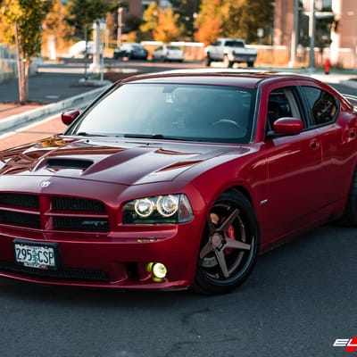 Staggered 20 Inch Ferrada FR3 in Matte Bronze w/Gloss Black Lip on a 2007 Dodge Charger SRT