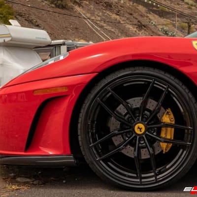 Staggered 20 Inch Variant Krypton in Gloss Piano Black on a 2006 Ferrari F430