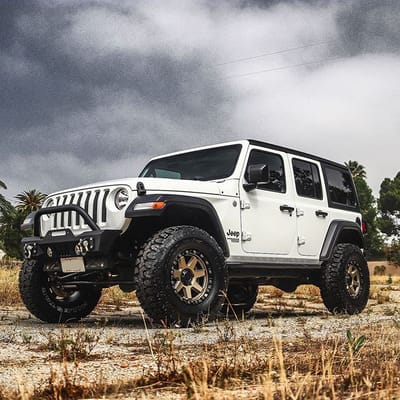 17 inch MKW Off-Road Beadlock M203 Matte Bronze on 2015 Jeep Wrangler Lifted