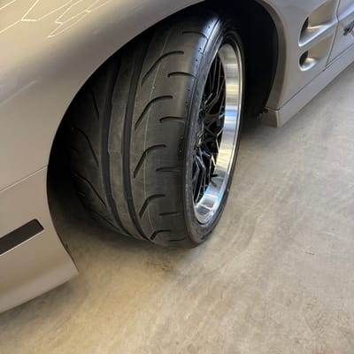18 inch staggered ace alloy aff04 gloss black on 2001 Pontiac trans am front wheel close up