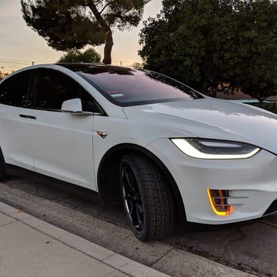 Staggered 22" Blaque Diamond BD-23 In Gloss Black W/ Stainless Steel Lip on a 2018 Tesla  Model X
