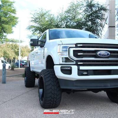 24 inch American Truxx AT1905 Blade Matte Black Milled on a Lifted 2021 Ford F-350