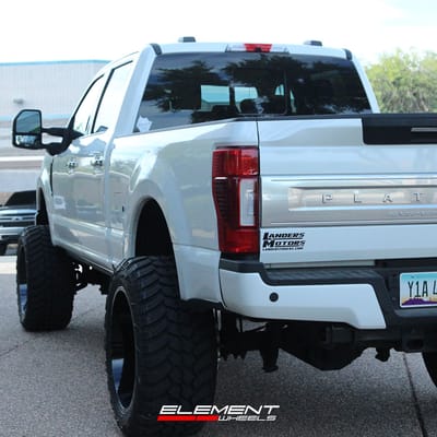 24 inch American Truxx AT1905 Blade Matte Black Milled on a Lifted 2021 Ford F-350