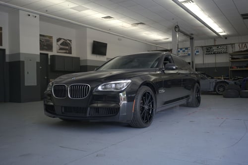 Staggered 20 Inch Variant Argon in Gloss Black on a 2014 BMW 750Li