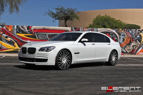 22 in staggered Lexani Wraith Gloss Black w/ color matched white paint om 2013 BMW 750Li