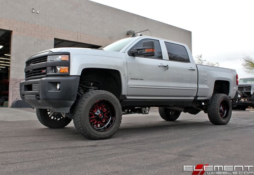 20x10 Fuel Off-Road Stroke Gloss Black w/ Candy Red on a 2016 Chevy Silverado 2500 w/ Specs