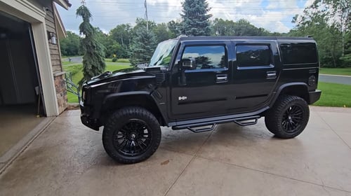 22 inch Fuel Offroad Rebel 8's in Matte Black on a 2004 Hummer H2