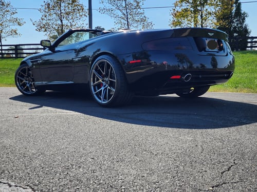 Staggered 20 inch Ace Alloy AFF02's in Black Chrome on a 2005 Aston Martin DB9