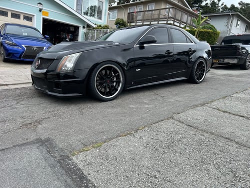 Staggered 20 inch Ferrada CM2's in Matte Black on a 2009 Cadillac CTS-V