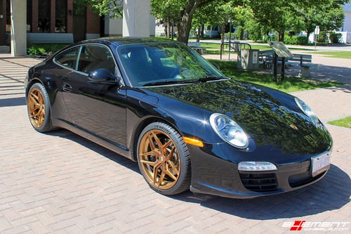 Staggered 19 Inch Variant Xenon in Brushed Bronze on a 2009 Porsche 911 C2