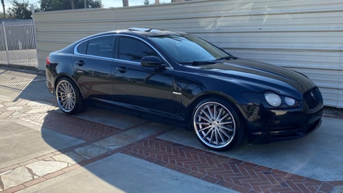 Staggered 20 inch AZAD AZ24 in Brushed Face w/ Chrome Lip on a 2011 Jaguar XF