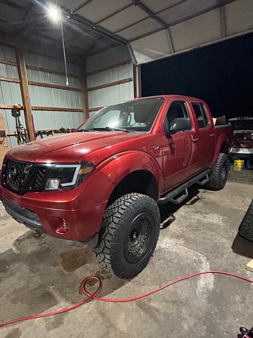 18 inch Black Rhino Barracade in OD Green w/ Black Rock Guard on a 2015 Nissan Frontier