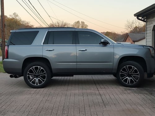 22 Inch Factory Reproductions FR49 in Gloss Black Machined Face on a 2018 GMC Yukon