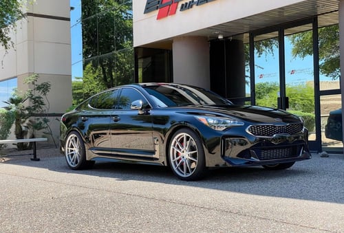 Staggered 20 Inch Rohana RFX2 in Brushed Titanium on a 2018 Kia Stinger GT