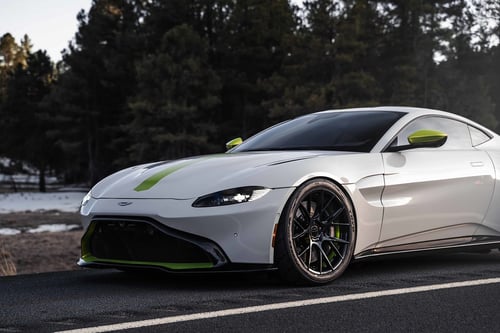20 inch Staggered Blaque Diamond BD-F18 Gloss Black w/ Shocker Yellow Barrel on a 2019 Aston Martin Vantage